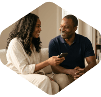 Couple discussing a property purchase